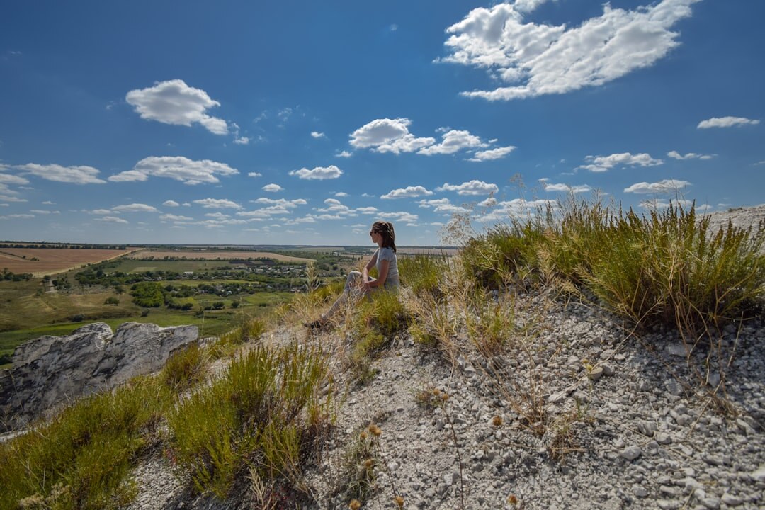 person meditating outdoors