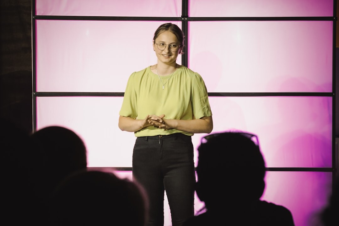 confident person speaking on stage